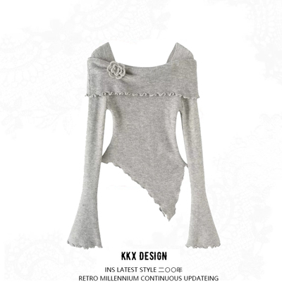 Sexy off-shoulder sweater with a flared neckline and irregular knitted sweater