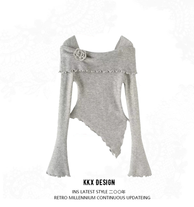 Sexy off-shoulder sweater with a flared neckline and irregular knitted sweater