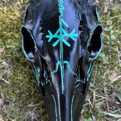 Blacked out deer skull with loki bindrune 