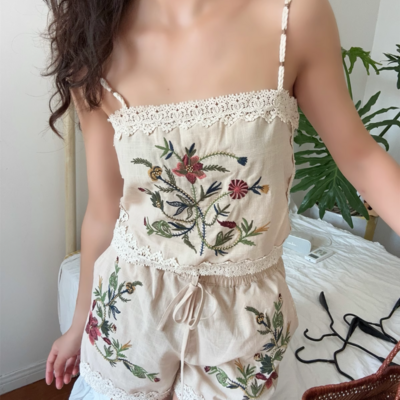 Fashionable embroidered top and casual shorts